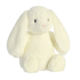 Weiches, hellgelbes Plüschkaninchen mit langen Ohren und einem freundlichen Gesicht, sitzt aufrecht.
