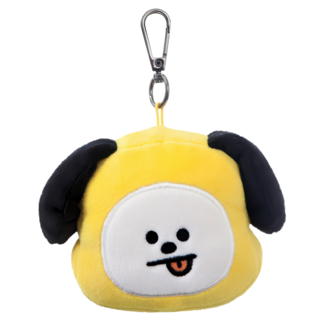 Gelbes Plüschspielzeug in Form eines Hundes mit schwarzen Ohren und einem lächelnden Gesicht, ausgestattet mit einem Clip.