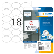 Packung mit ablösbaren Etiketten von Herma, mit der Aufschrift "Außer Betrieb. Out of order." und der Nummer 18.