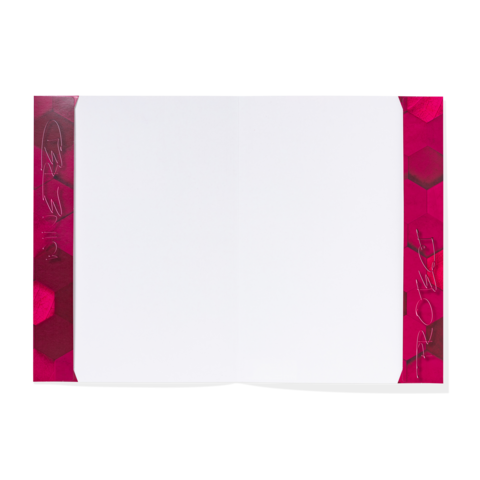 Ein leeres Notizbuch mit einem pinken, hexagonalen Muster auf den Seitenrändern.