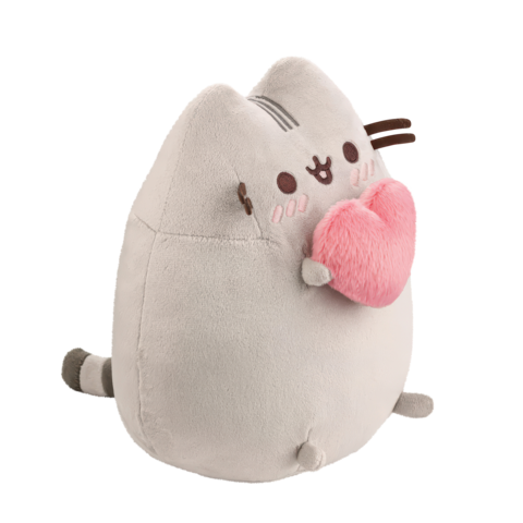 Kuscheltier in Form einer Katze mit einem herzförmigen Kissen, das eine freundliche Mimik zeigt.