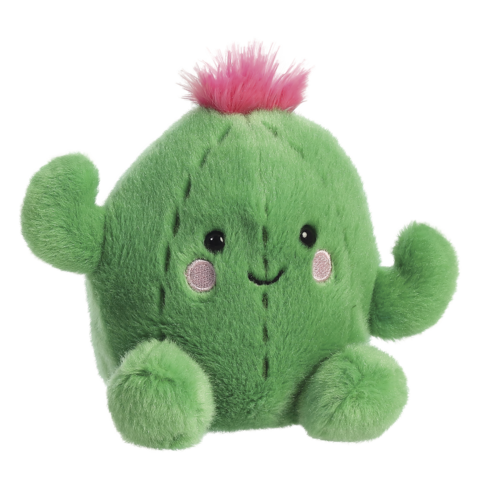 Kuscheliger, grüner Kaktus mit einem lächelnden Gesicht und rosa Blüte auf dem Kopf, mit kleinen Armen und weichem Material.