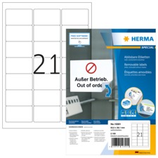 Ein Blatt mit ablösbaren Etiketten, das die Aufschrift "Außer Betrieb. Out of order" zeigt, sowie die Produktdetails von Herma.