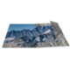Berglandschaft mit schroffen Gipfeln und Gletschern, die sich über eine weite Fläche erstrecken. Klare Himmel und felsige Strukturen sind sichtbar.