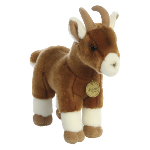 Plüschziege mit braunem Fell und weißen Beinen, ausgestattet mit einem kleinen Anhänger.