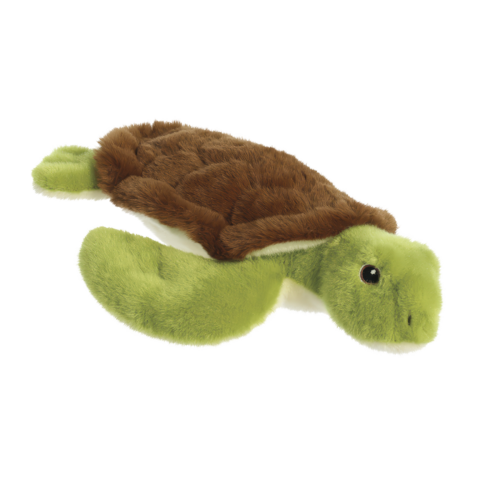 Plüschschildkröte mit grünem Körper und braunem Panzer, liegend auf einer weißen Unterlage.