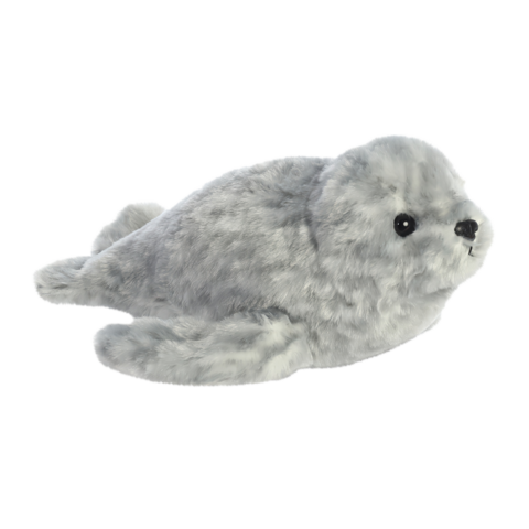 Plüschrobbe in grauer Farbe mit schwarzen Augen und einem runden Kopf, liegend auf einer flachen Oberfläche.
