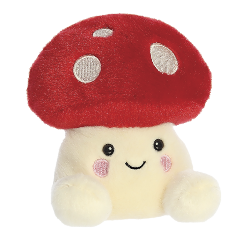 Plüschpilz mit rotem Hut und weißen Punkten, lächelnd mit rosa Wangen und kleinen Händen.