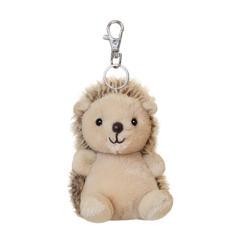 Plüschig, beige Igel mit einem Lächeln und einem Clip zum Befestigen. Ideal als Schlüsselanhänger oder Spielzeug.