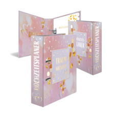 Ein Hochzeitsplaner in sanften Rosa- und Goldtönen, mit dem Titel „Traum Hochzeit“ auf der Vorderseite.