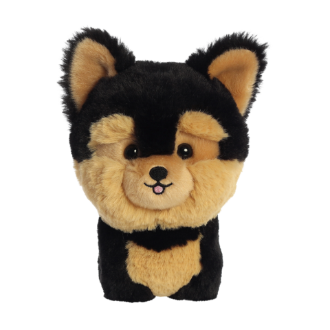 Plüschfigur eines Hundes mit schwarzen und braunen Fellmustern, großen Augen und einem freundlichen Gesichtsausdruck.