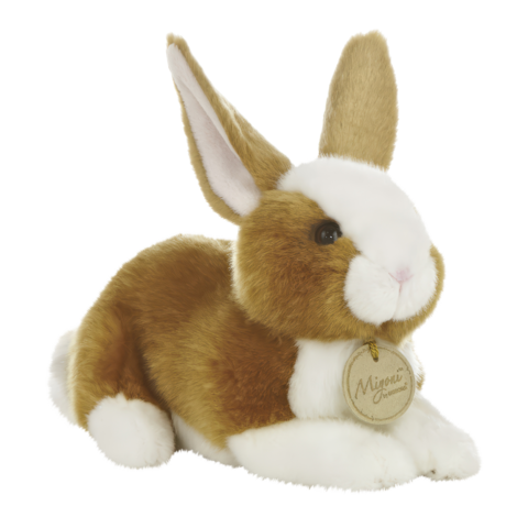Plüschhase mit braun-weißen Fell, aufrecht sitzend, mit langen Ohren und einem Anhänger, der den Namen "Mignon" trägt.
